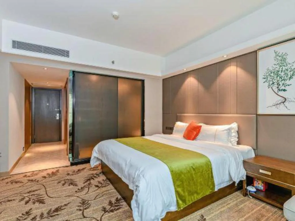 Bed in New Pearl River Hotel