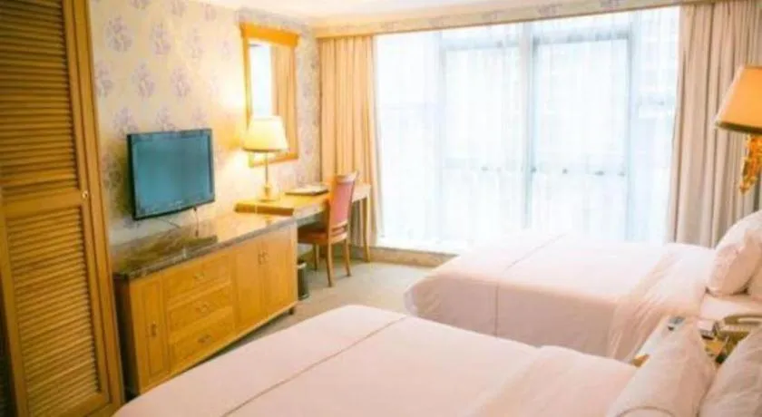 Bed in New Pearl River Hotel