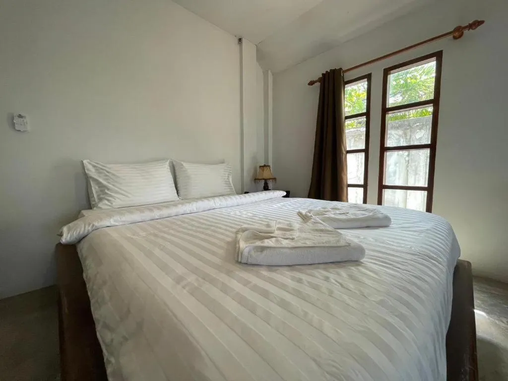 Bed in Rose Garden Samui Bungalows