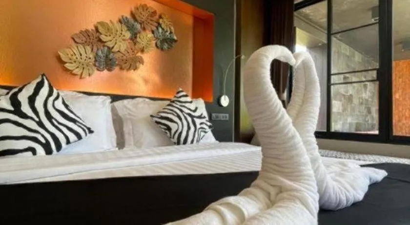 Bed in Rose Garden Samui Bungalows