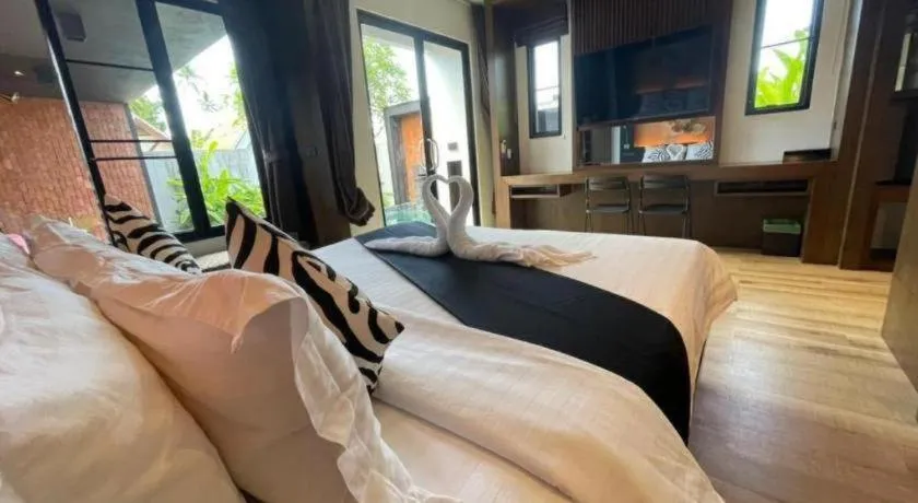 Bed in Rose Garden Samui Bungalows