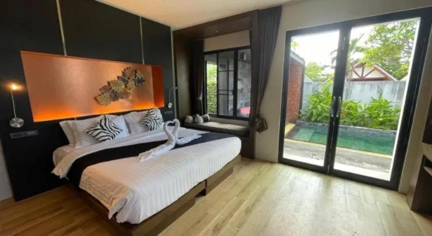 Bed in Rose Garden Samui Bungalows