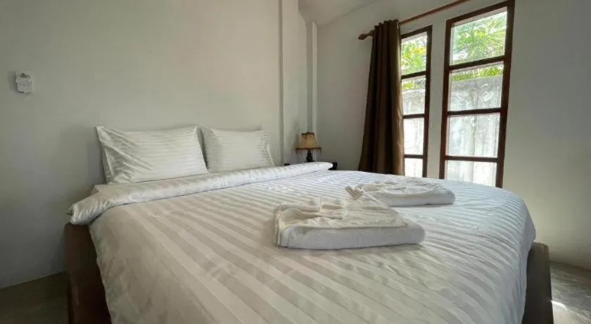 Bed in Rose Garden Samui Bungalows