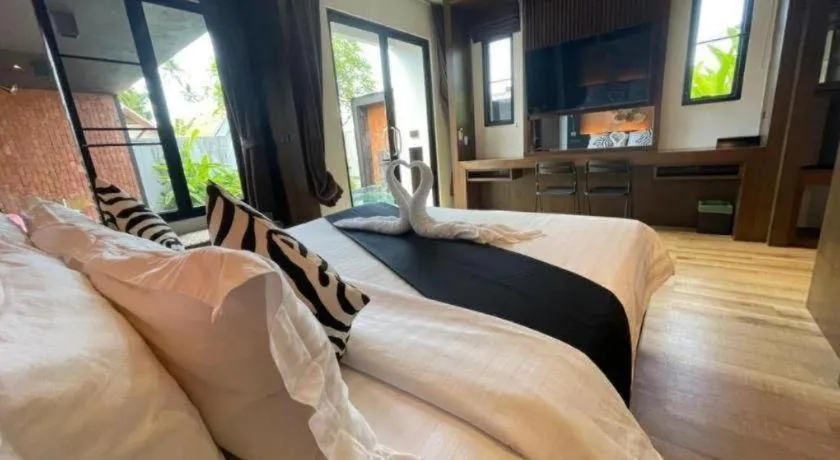 Bed in Rose Garden Samui Bungalows