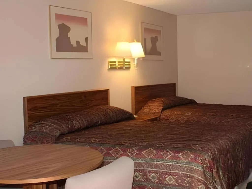 Bed in Baymont by Wyndham Grand Junction