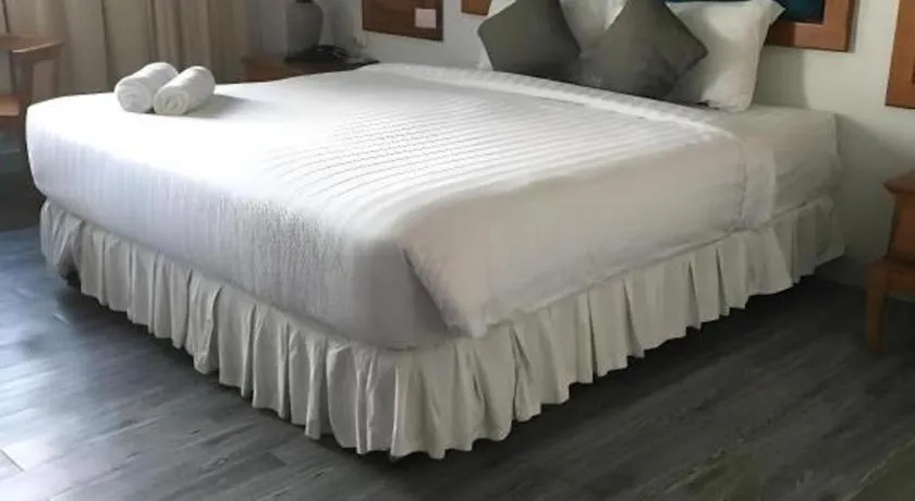 Bed in Thepnakorn Hotel