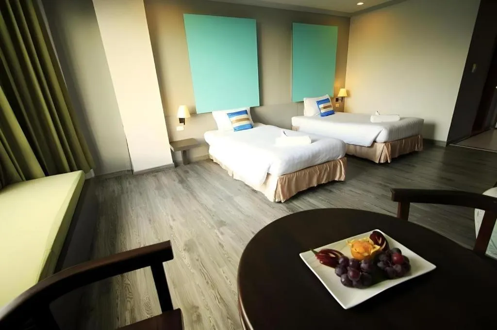 Bed in Thepnakorn Hotel