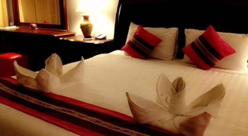 Bed in Thepnakorn Hotel