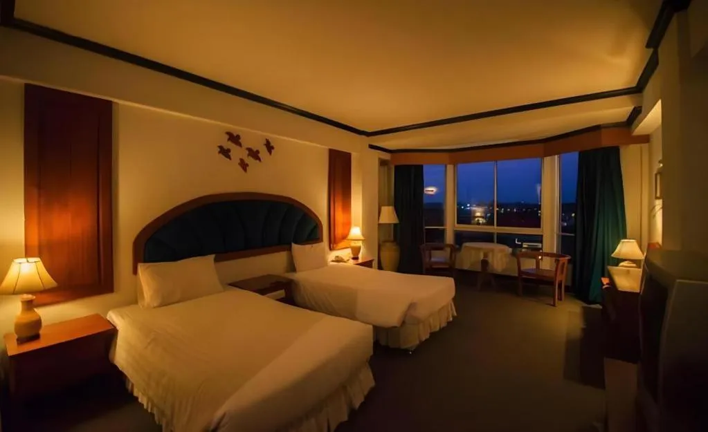 Bed in Thepnakorn Hotel