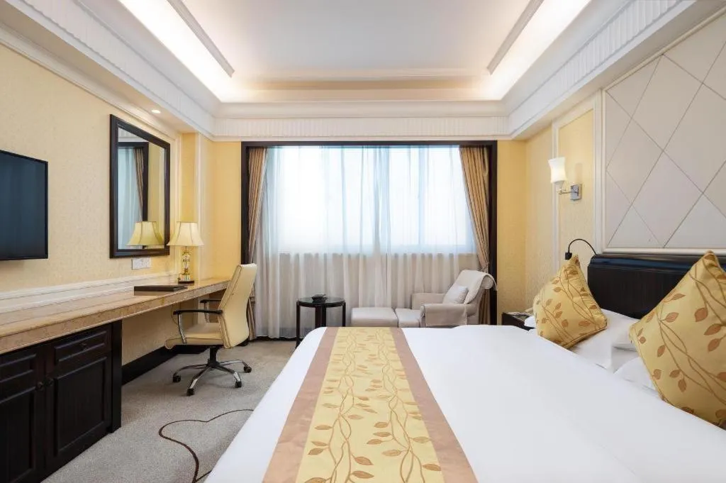 Bed in Sun City Hotel Haikou