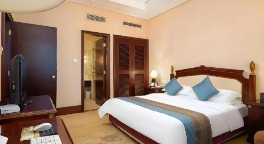 Bed in Sun City Hotel Haikou