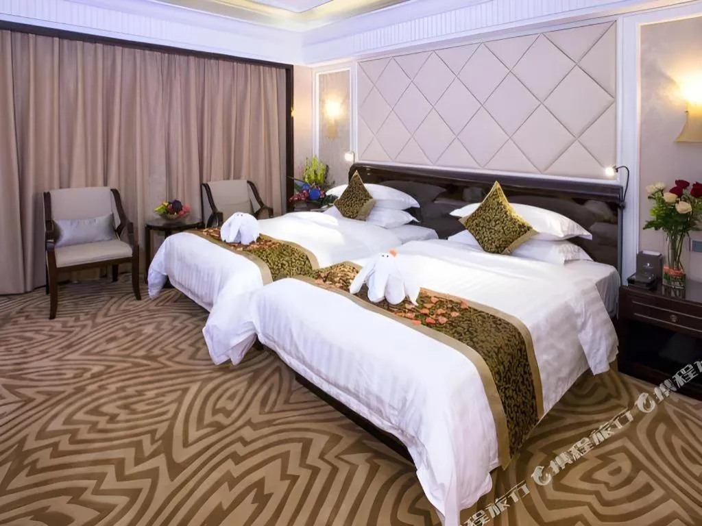 Bed in Sun City Hotel Haikou