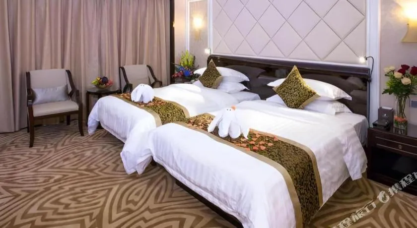 Bed in Sun City Hotel Haikou