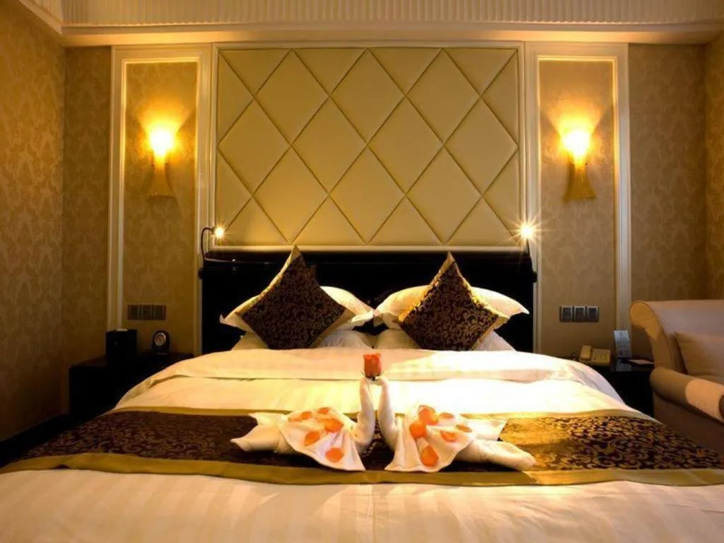 Bed in Sun City Hotel Haikou