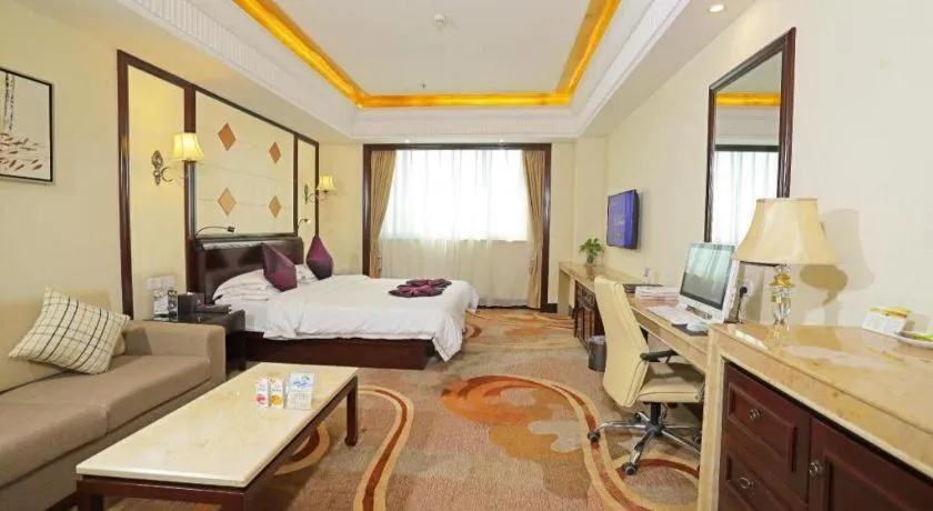 Bed in Sun City Hotel Haikou