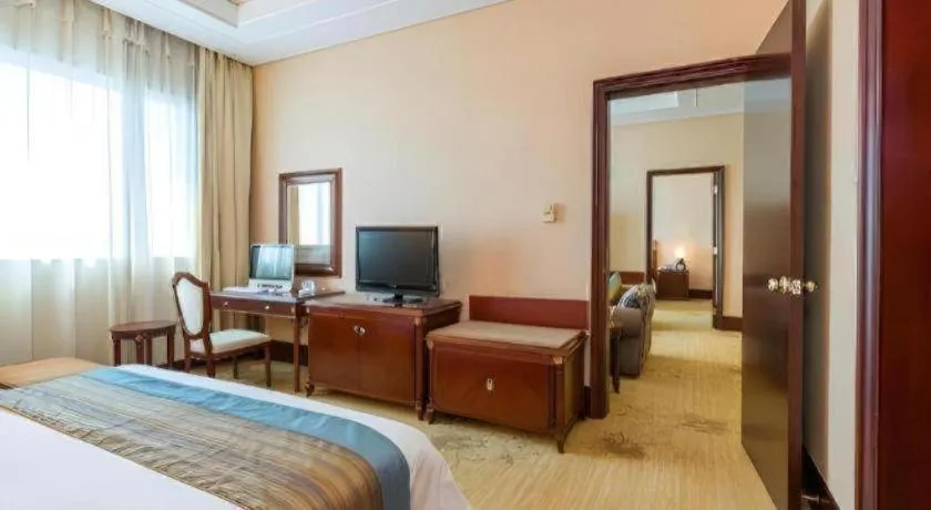 Bed in Sun City Hotel Haikou