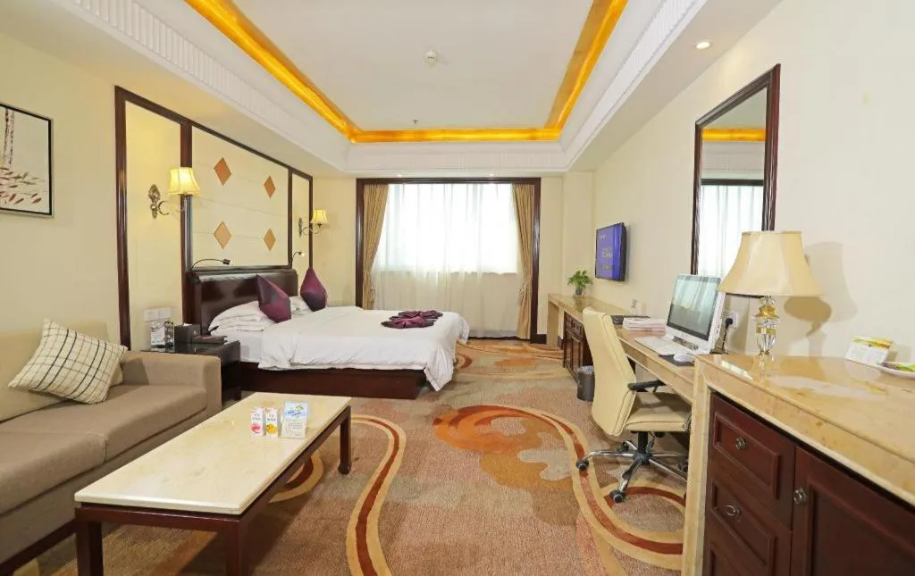 Bed in Sun City Hotel Haikou