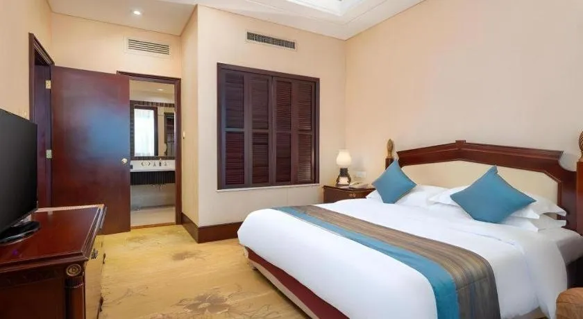 Bed in Sun City Hotel Haikou