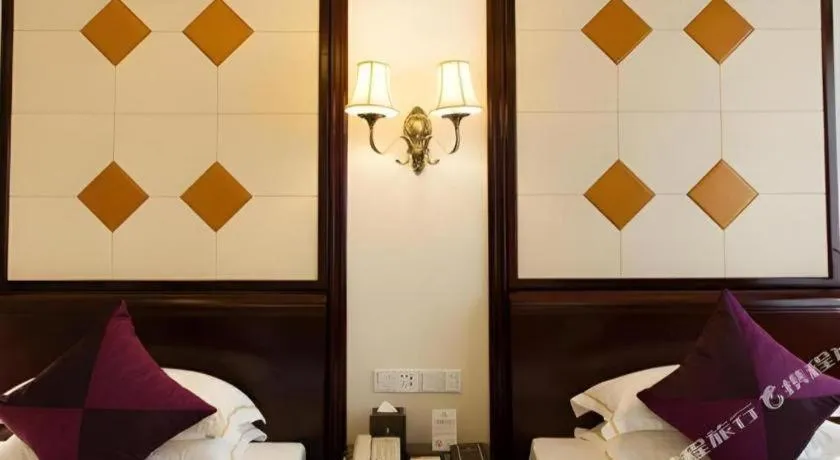 Bed in Sun City Hotel Haikou