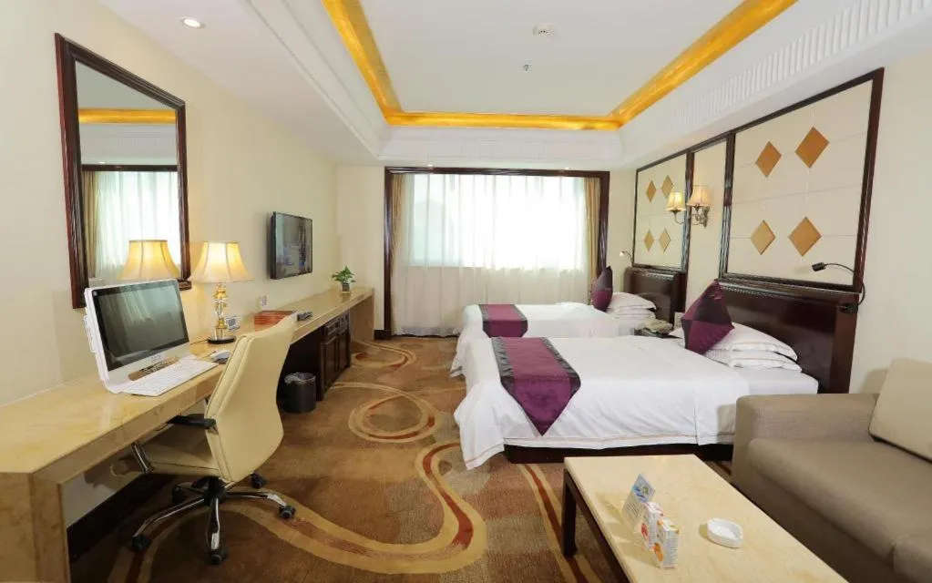 Bed in Sun City Hotel Haikou