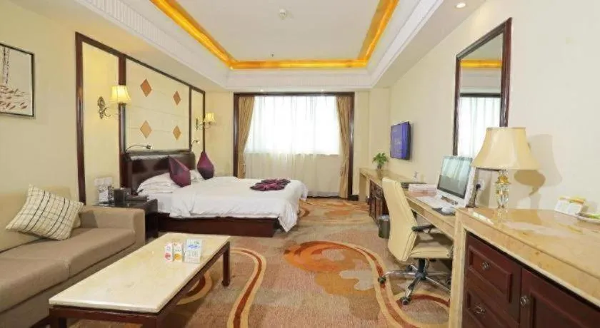 Bed in Sun City Hotel Haikou