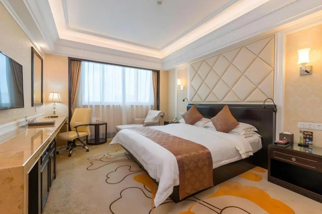 Bed in Sun City Hotel Haikou