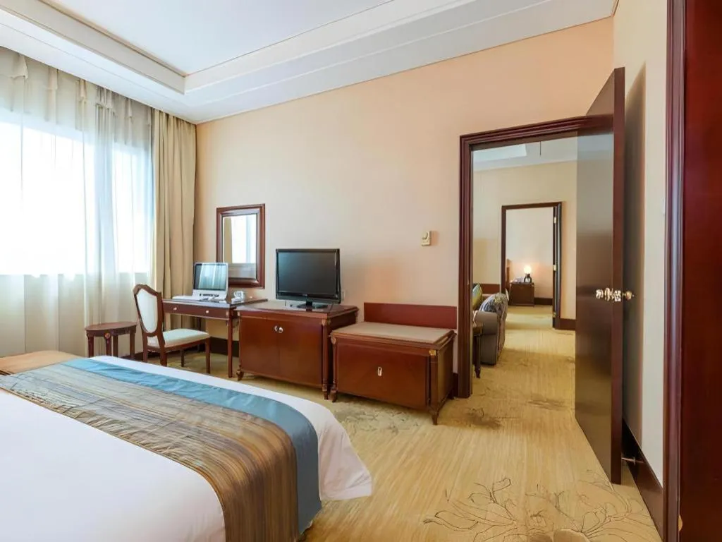 Bed in Sun City Hotel Haikou