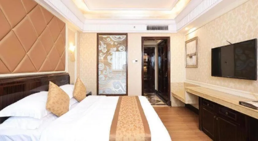 Bed in Sun City Hotel Haikou