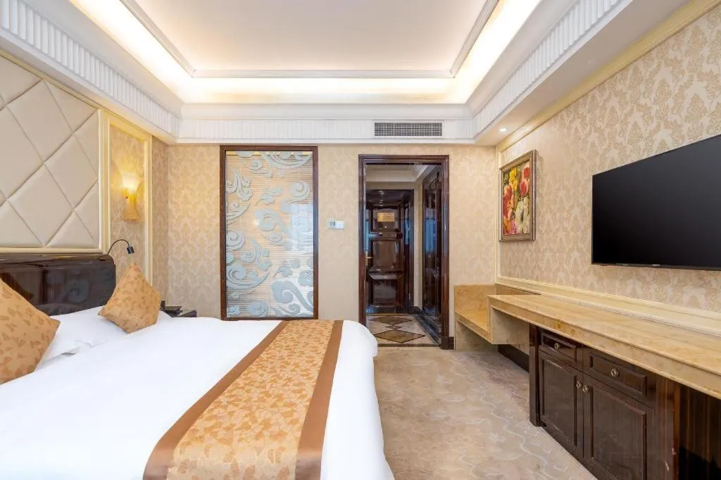 Bed in Sun City Hotel Haikou