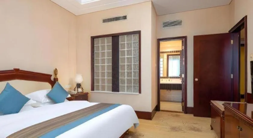 Bed in Sun City Hotel Haikou