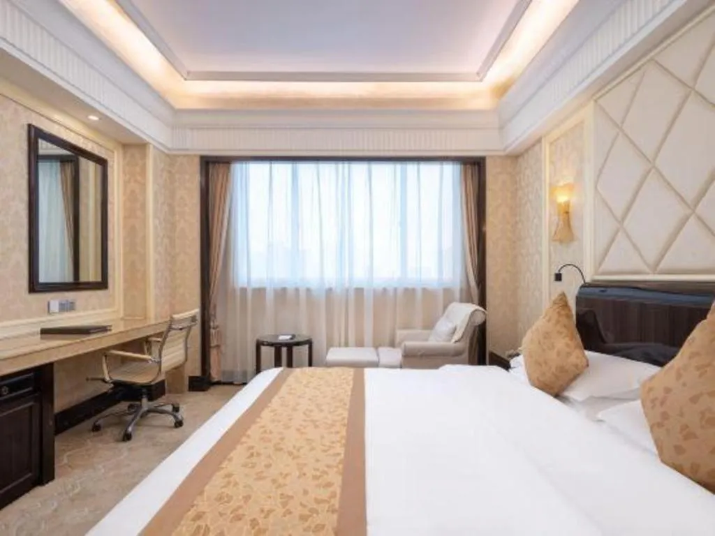 Bed in Sun City Hotel Haikou