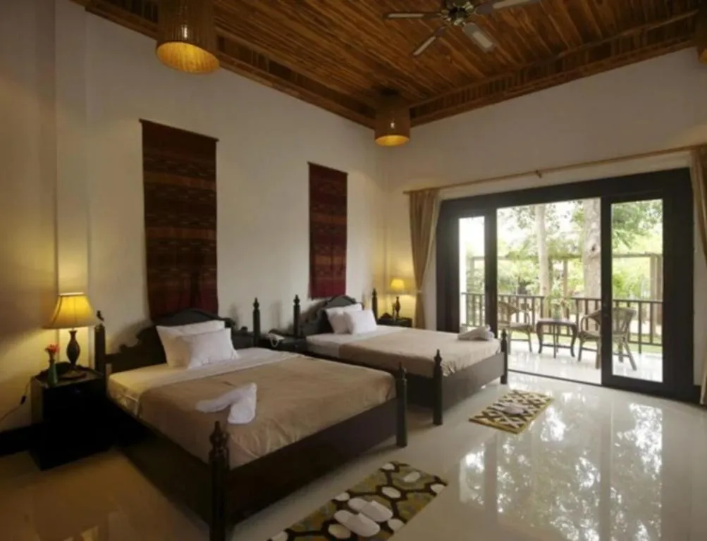 Bed in Nam Ou Riverside Resort