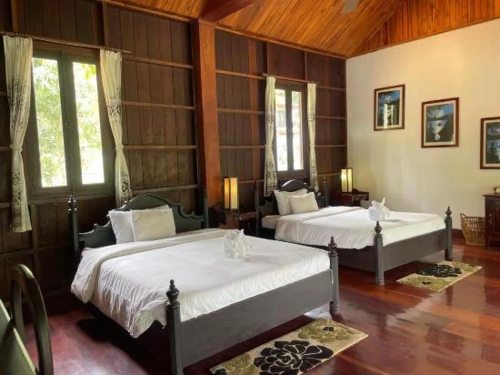 Bed in Nam Ou Riverside Resort