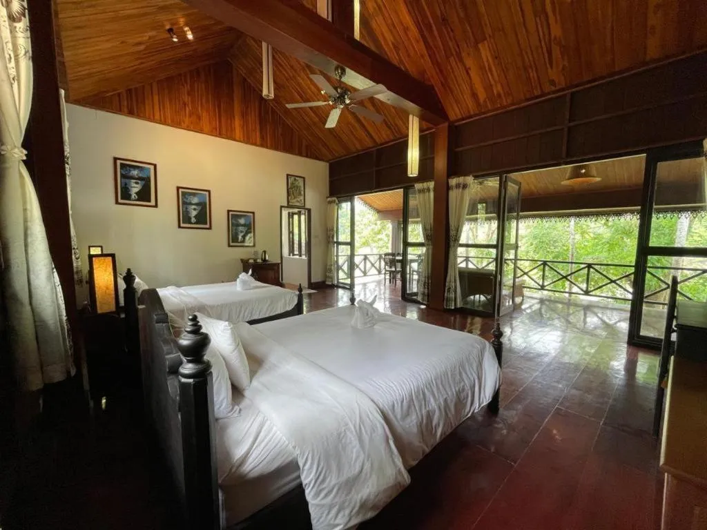 Bed in Nam Ou Riverside Resort
