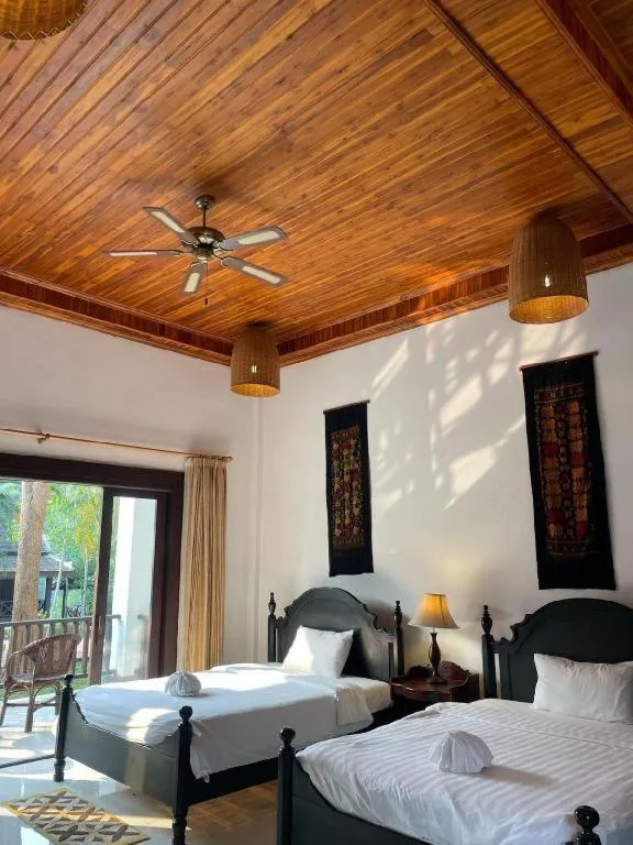 Bed in Nam Ou Riverside Resort