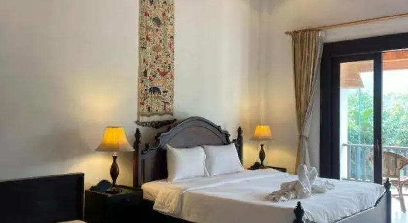 Bed in Nam Ou Riverside Resort Bed in Nam Ou Riverside Resort