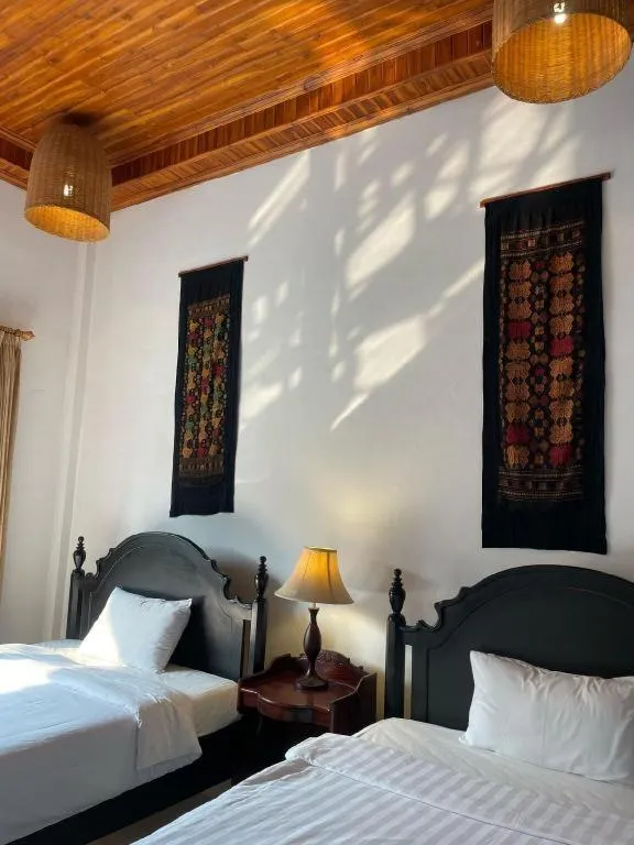 Bed in Nam Ou Riverside Resort