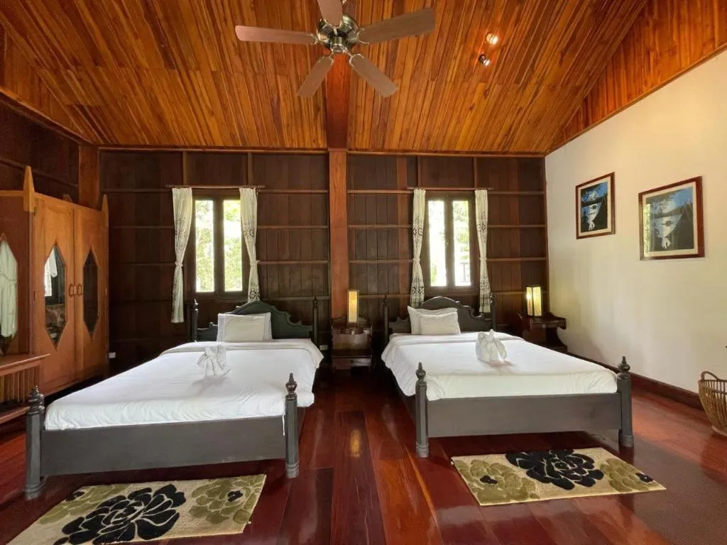 Bed in Nam Ou Riverside Resort