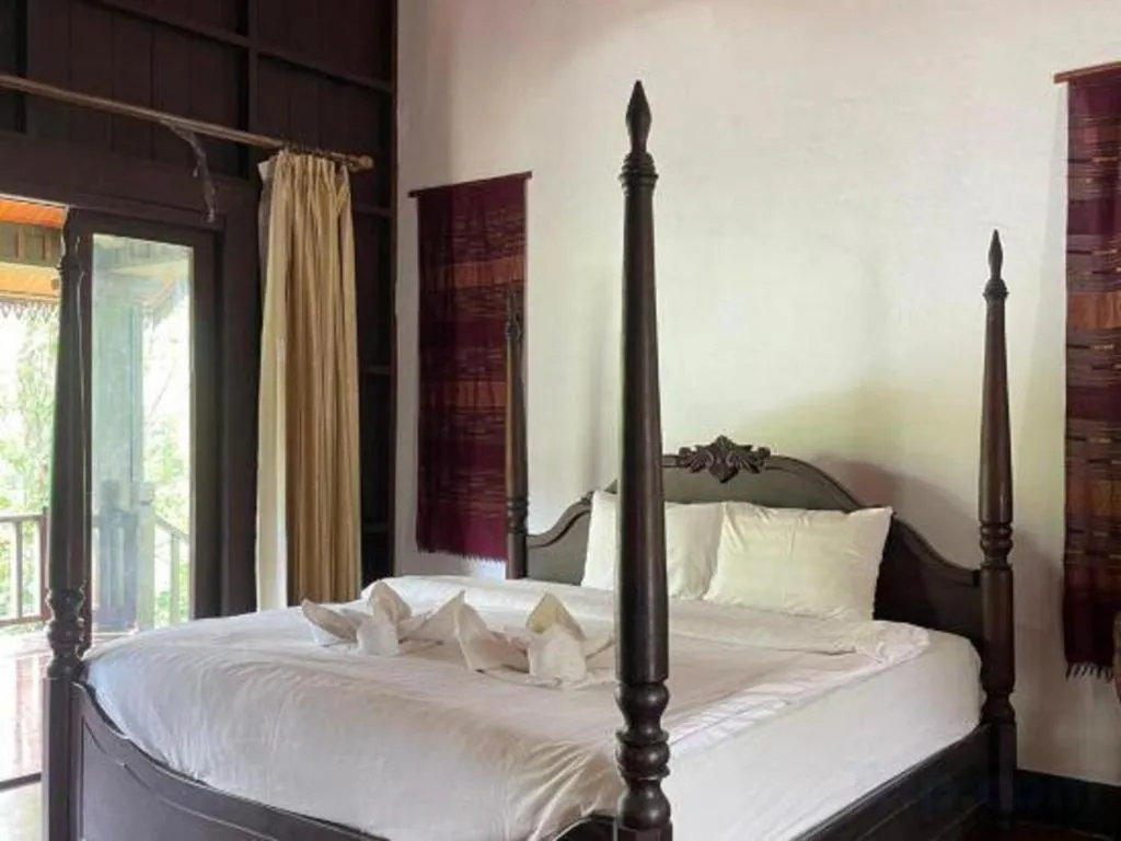 Bed in Nam Ou Riverside Resort