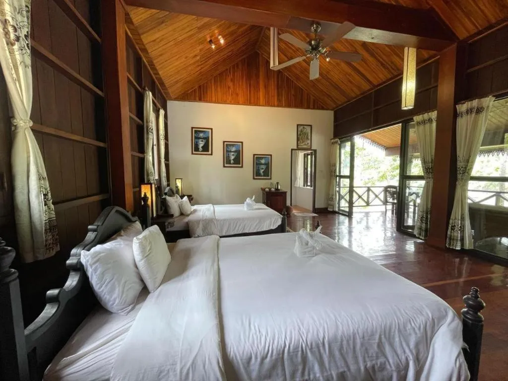 Bed in Nam Ou Riverside Resort