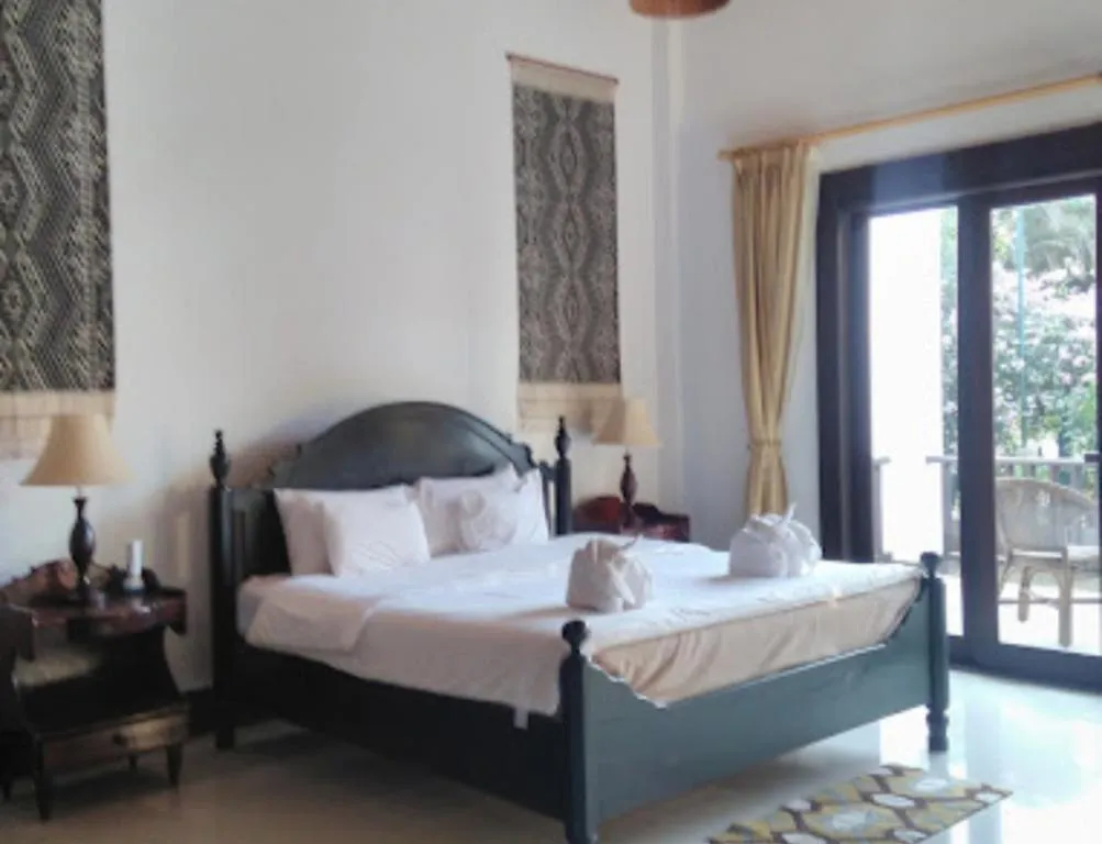 Bed in Nam Ou Riverside Resort