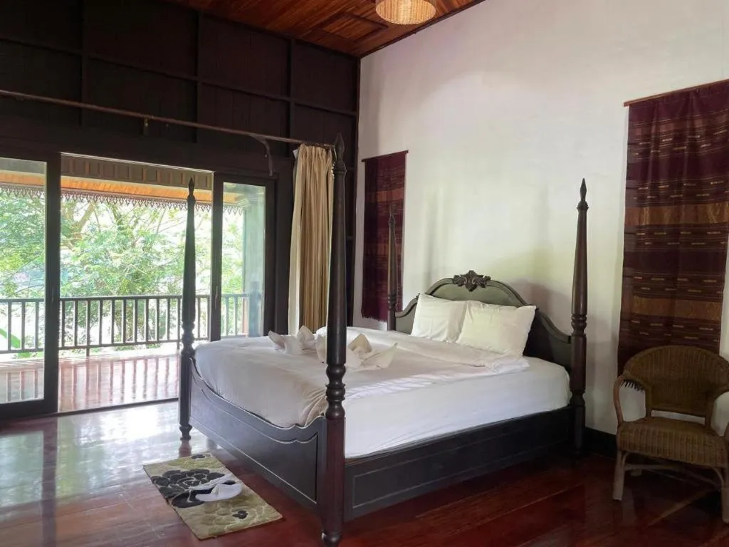 Bed in Nam Ou Riverside Resort