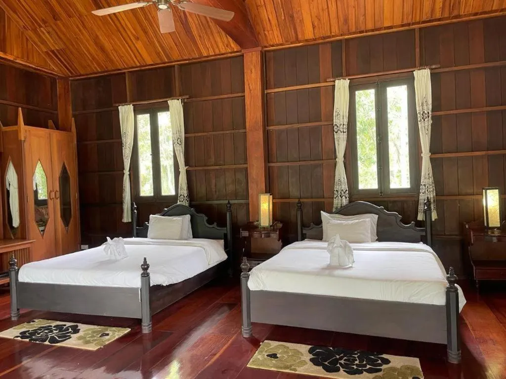 Bed in Nam Ou Riverside Resort