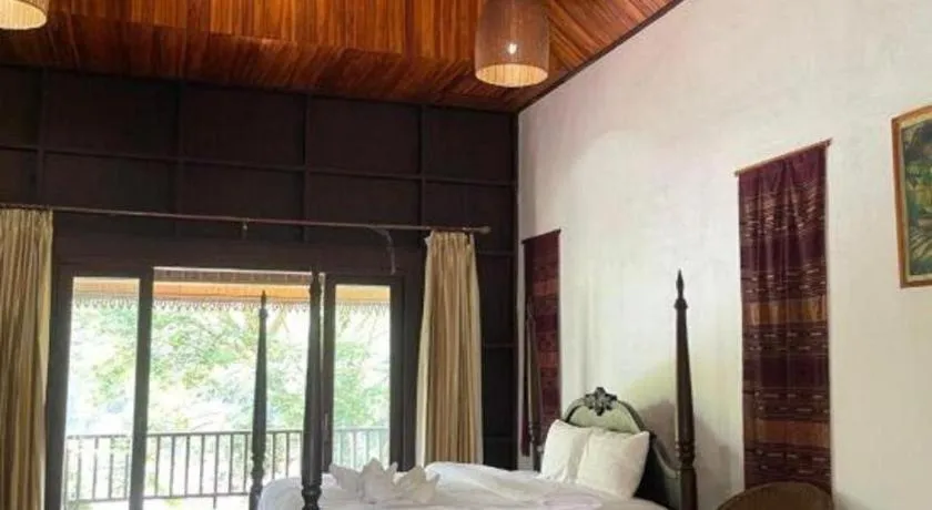 Bed in Nam Ou Riverside Resort