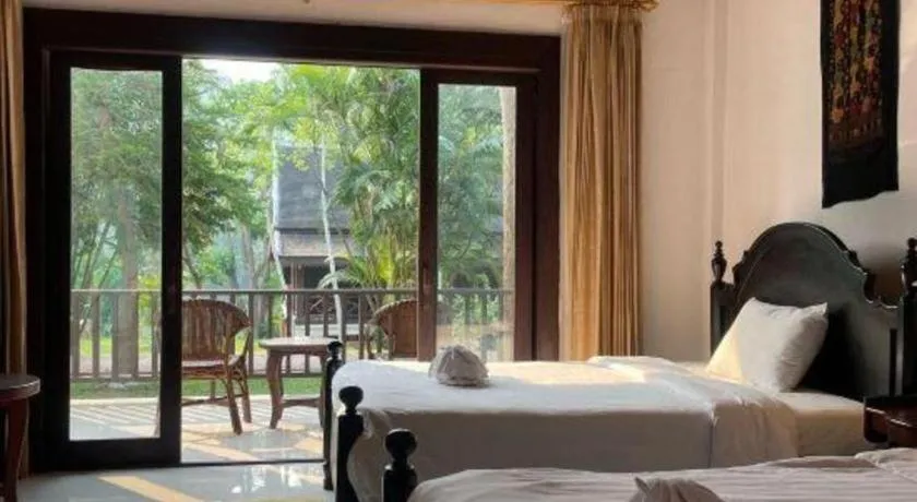 Bed in Nam Ou Riverside Resort