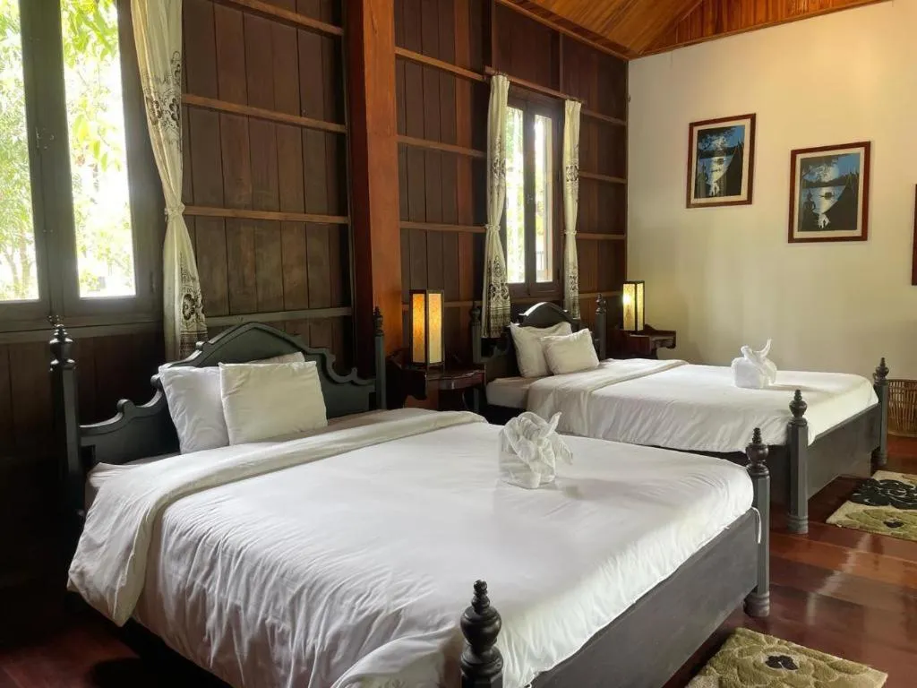 Bed in Nam Ou Riverside Resort