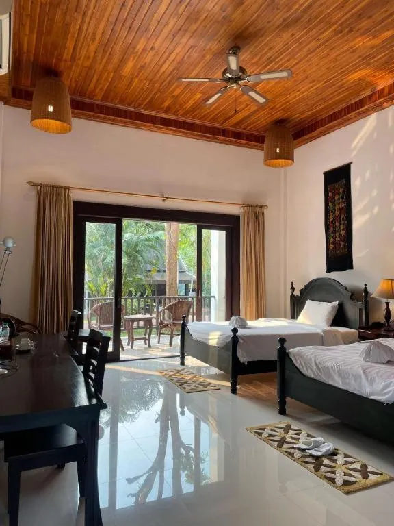 Bed in Nam Ou Riverside Resort