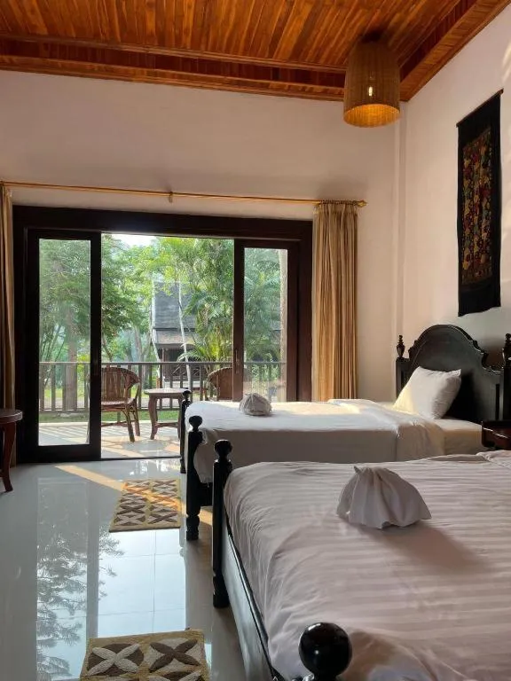 Bed in Nam Ou Riverside Resort