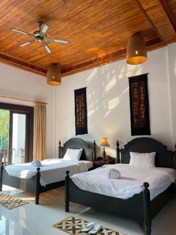 Bed in Nam Ou Riverside Resort