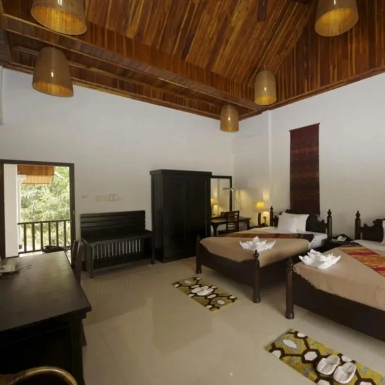 Bed in Nam Ou Riverside Resort